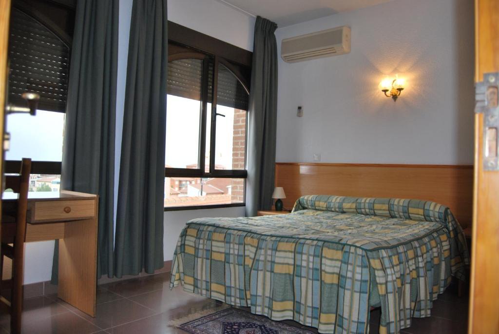 Hostal Cazalegas Pokoj fotografie